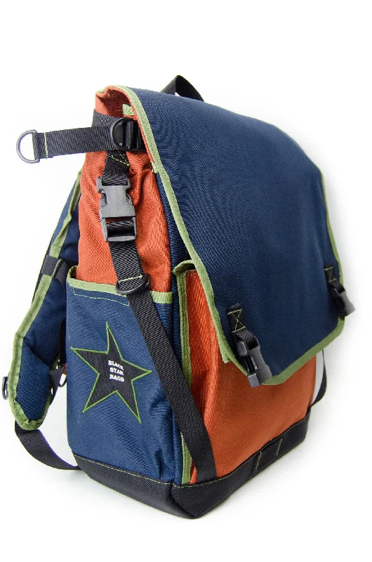 Compact backpack with side water bottle holders -Rust and Navy Flap Top Backpack