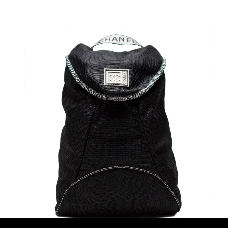 Reflective backpack for safe nighttime jogging -Chanel Microfiber Logo Backpack