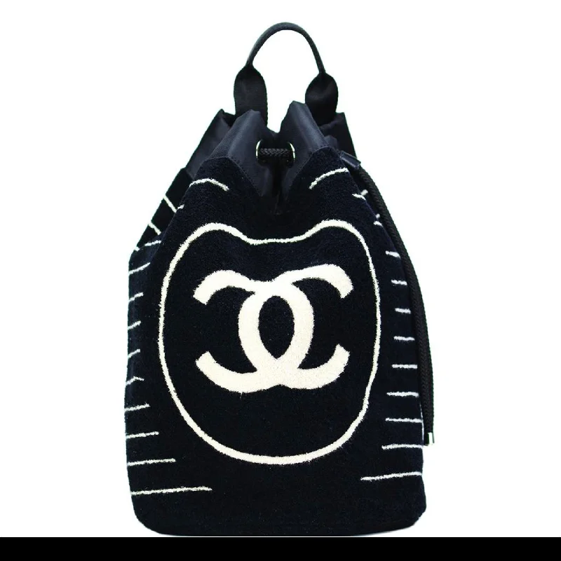 Sleek nylon backpack for lightweight travel ease -Chanel Dark Blue Striped Beach Bag Drawstring Backpack