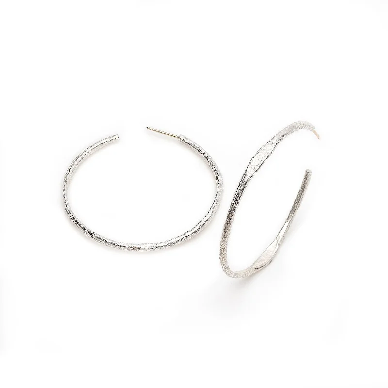 Hoop earrings with oversized designs for a bold, fashion-forward statement-Tonia