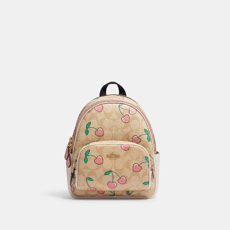 Designer leather backpack for upscale travel flair -Coach Outlet Mini Court Backpack In Signature Canvas With Heart Cherry Print