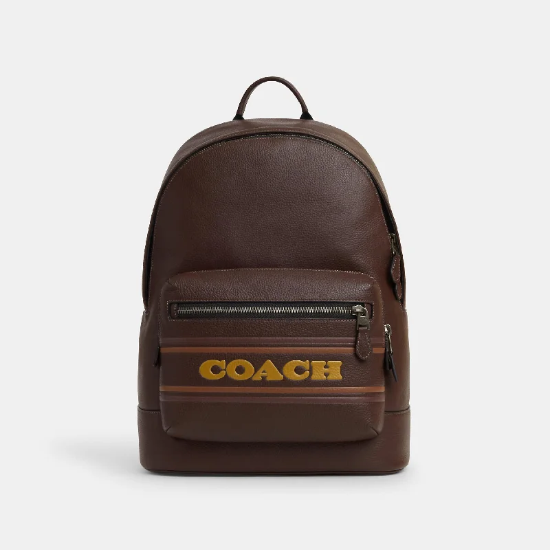 Brightly colored backpack for easy group spotting -Coach Outlet West Backpack With Coach Stripe